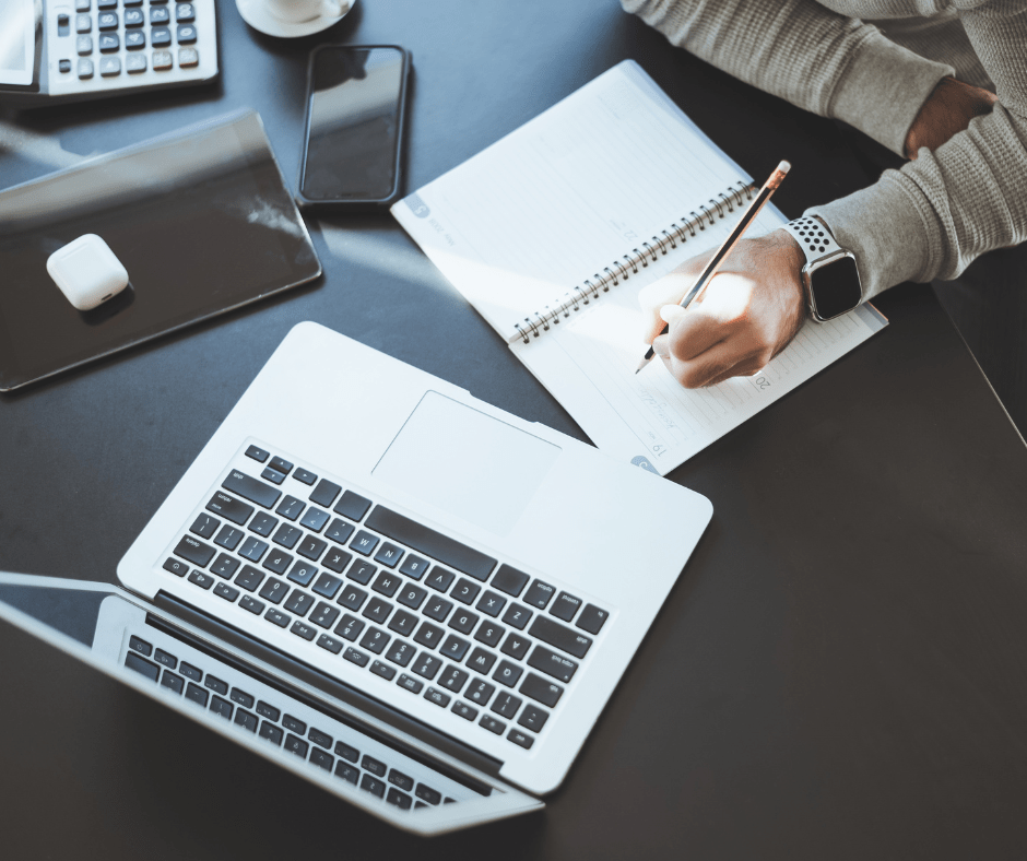 Photo of real estate agent working at their desk.