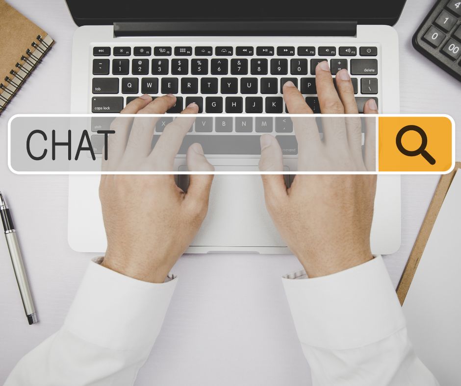 Agent typing on a laptop